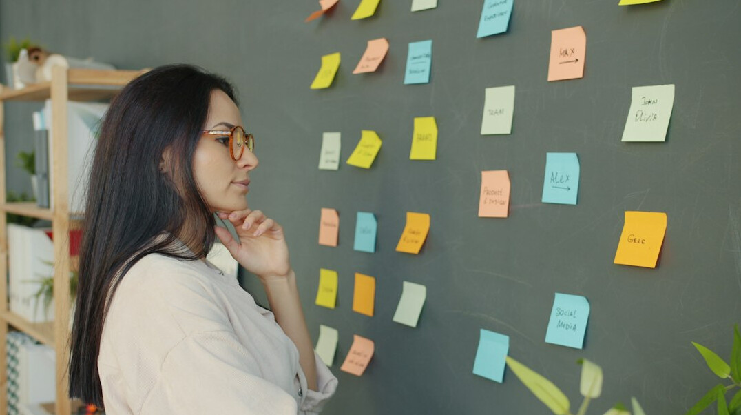 person reflecting on notes