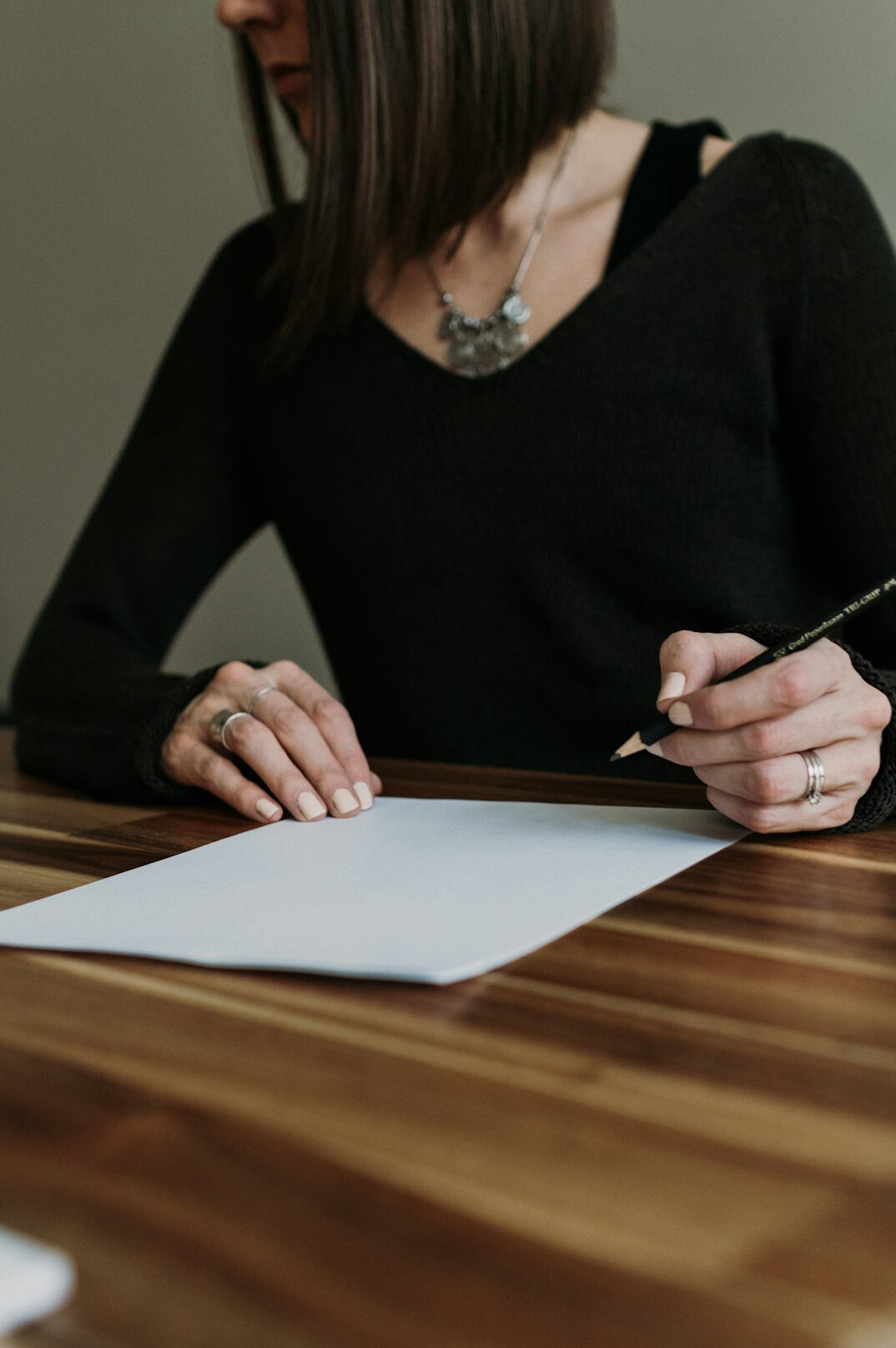 person planning goals on paper